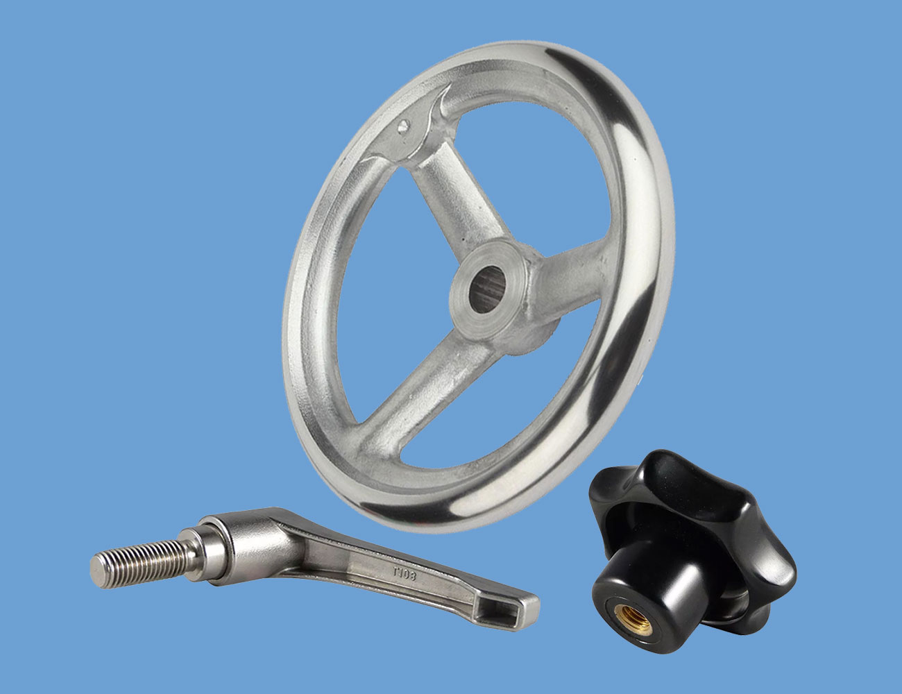 Knobs, handwheels, handles and grips